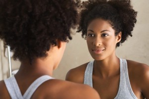Woman Looking in Mirror