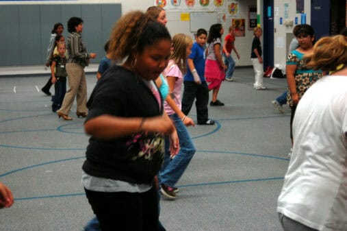 Children participating in an indoor group activity.